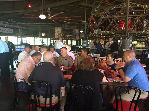 Image of people sitting around a table